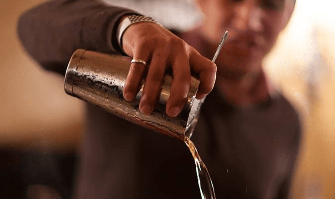 Bartender pouring